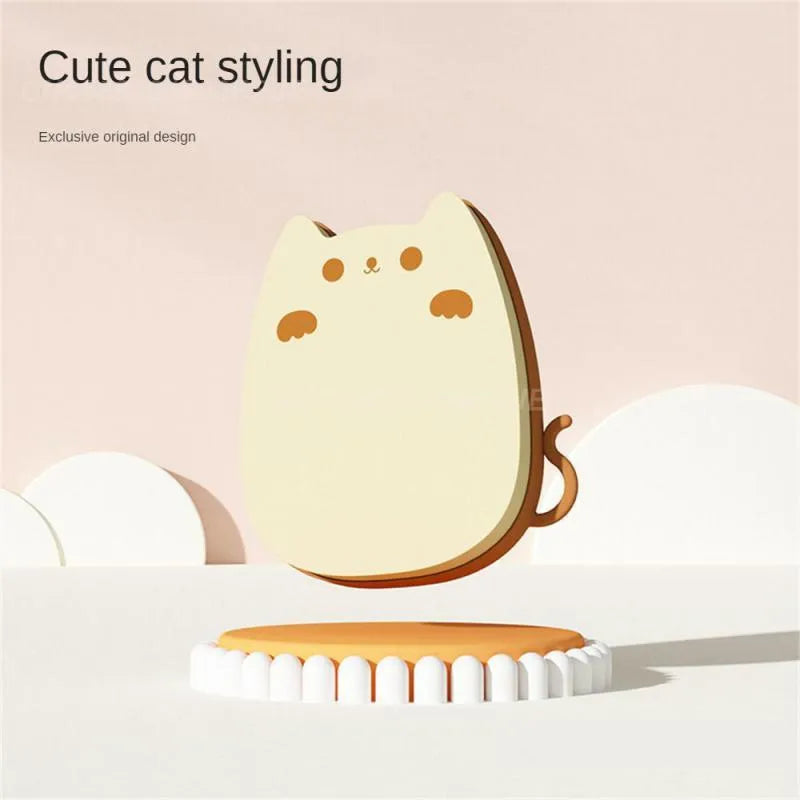 Brown silicone pet grooming brush with dual-texture comb teeth on a white background.