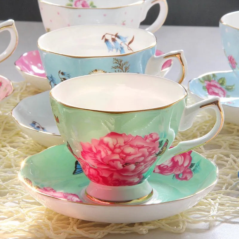 European porcelain coffee cup and saucer set with pastoral style pattern in assorted colours