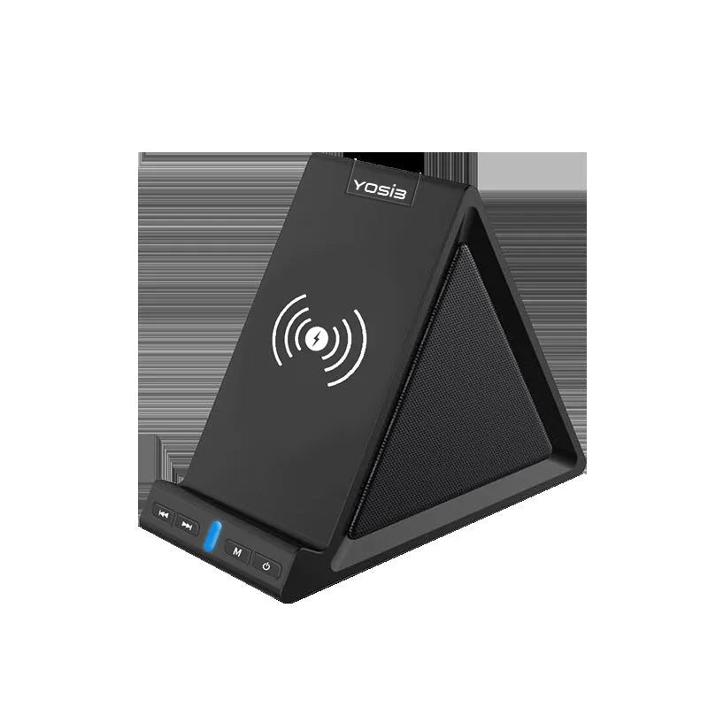 Black multifunctional power bank with integrated Bluetooth speaker and wireless charging phone stand on a desk.