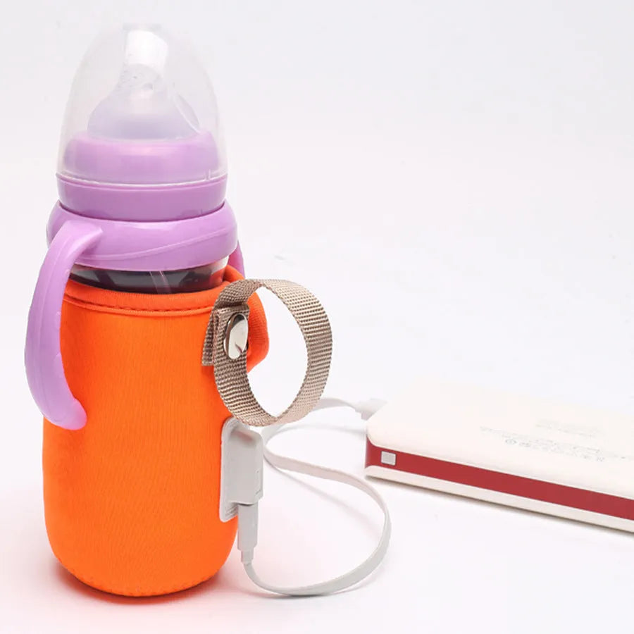 Blue USB-powered baby bottle warmer sleeve on a milk bottle showing USB cable.