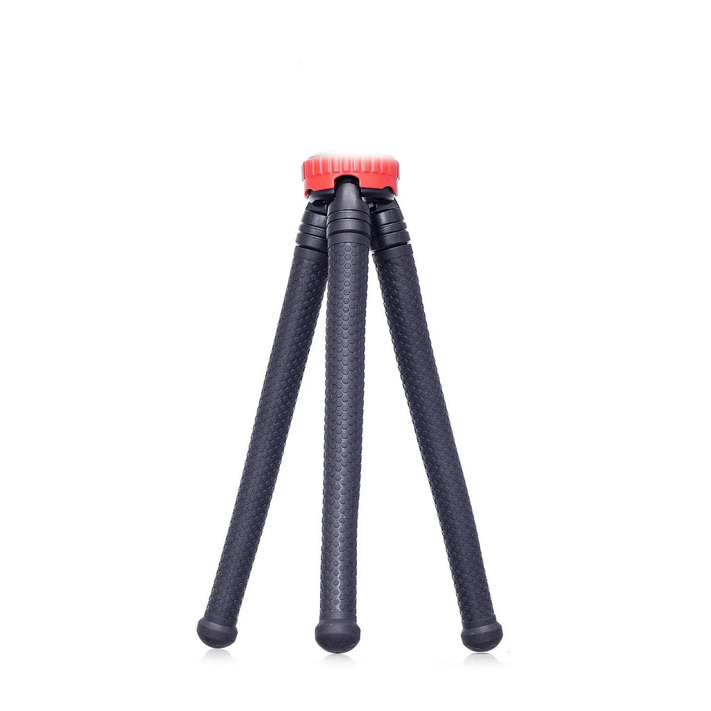 Black octopus tripod with flexible rubber legs wrapped around a pole, holding a mobile phone.