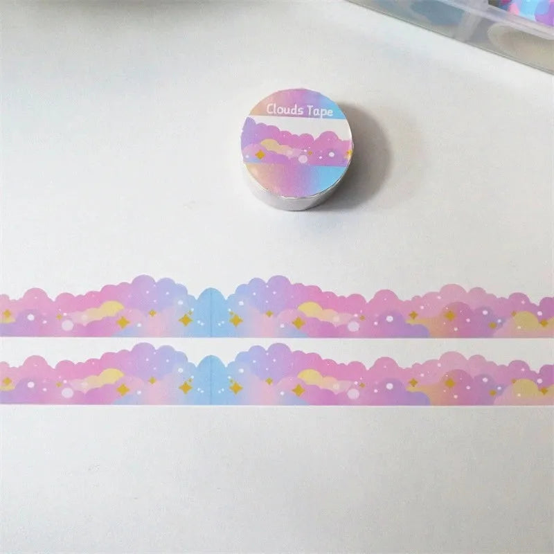 Roll of stars and clouds border pattern washi tape on a white background, showing 24mm width.