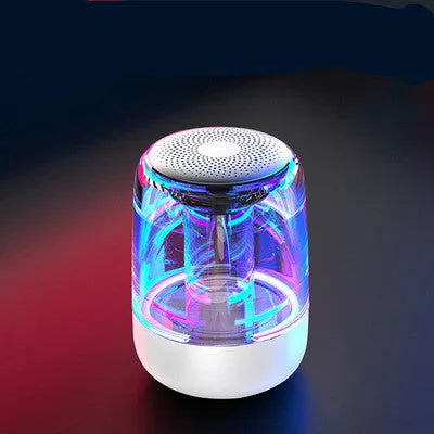 Portable Bluetooth speaker with powerful bass, variable colour LED light, compact size 90x68mm in black