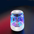 Portable Bluetooth speaker with powerful bass, variable colour LED light, compact size 90x68mm in black