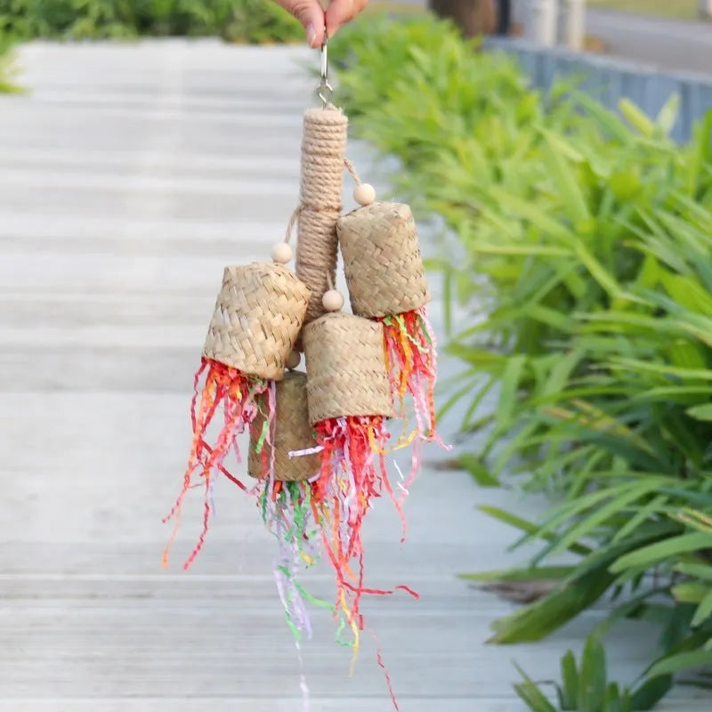 Colourful wooden shredded paper parrot chewing toy with sisal rope hanger