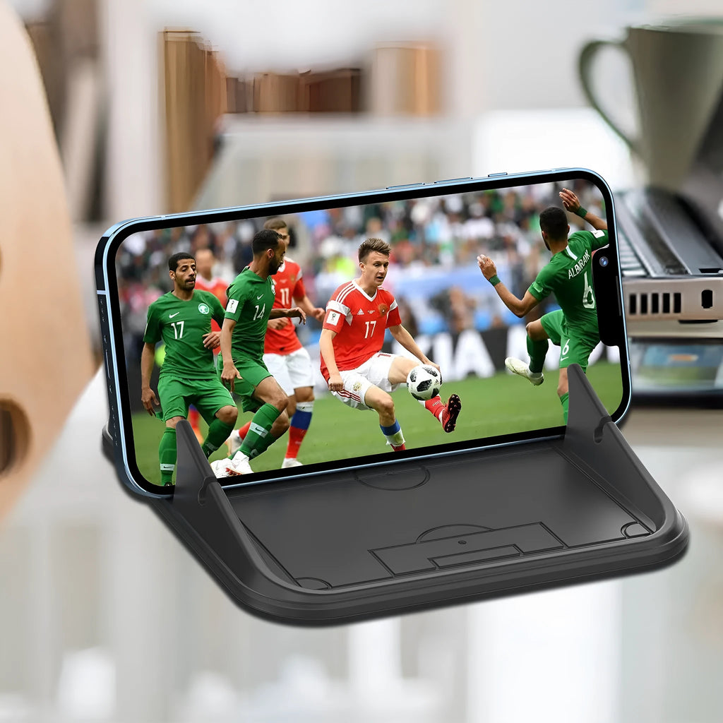 Peak-X5 coloured silicone automobile phone holder for car or desk.
