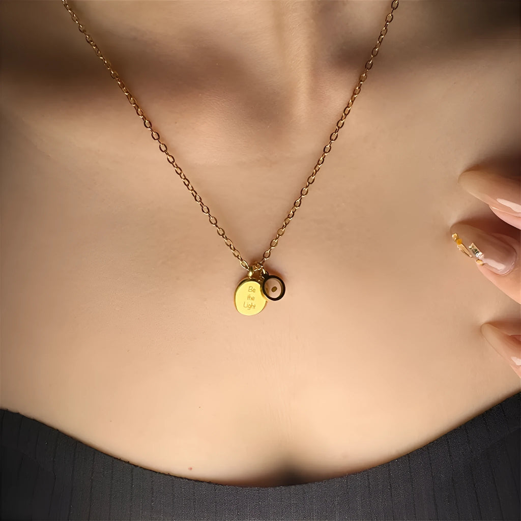 Stainless steel mustard seed faith pendant necklace on adjustable chain, silver colour, geometric shape with drip oil finish