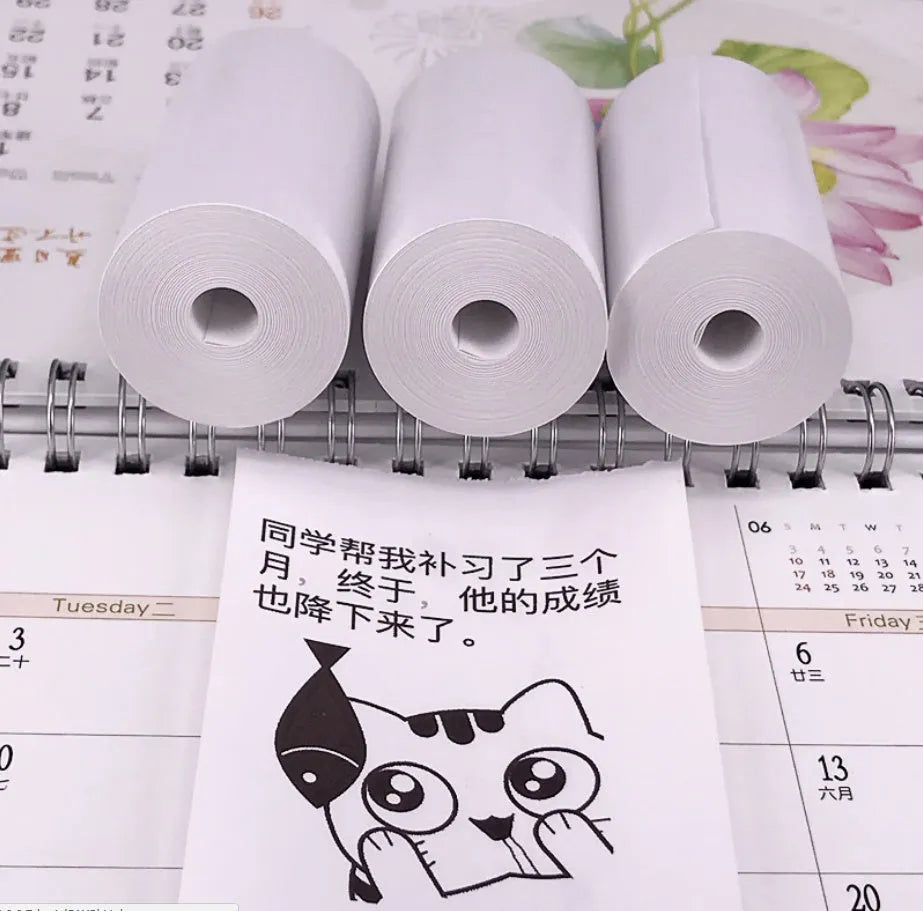PerPage mini thermal printer paper rolls in regular, sticker, and label types with blue, pink, white, violet, and yellow options