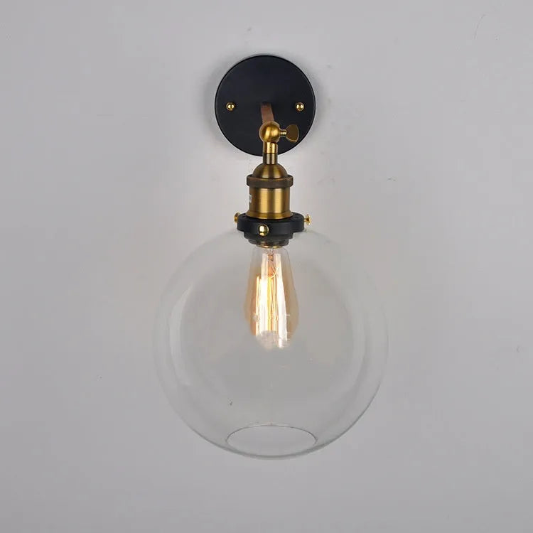Retro round glass ball wall lamp in amber finish, 20cm diameter, with E27 holder.