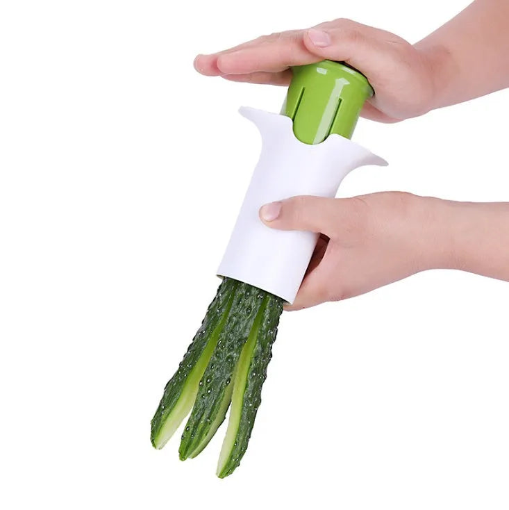 White kitchen vegetable and fruit slicer with six stainless steel blades.