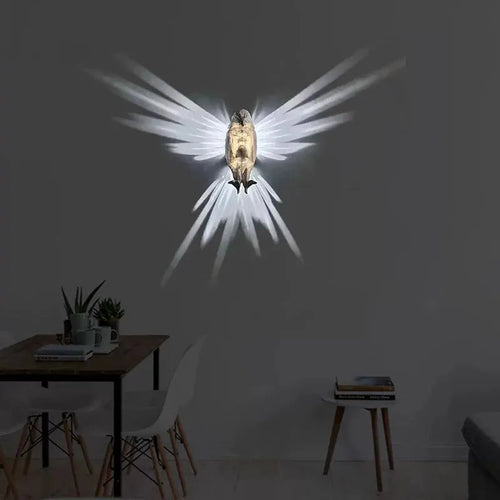 3D printed eagle silhouette wall lamp with multicoloured projection lighting on wall