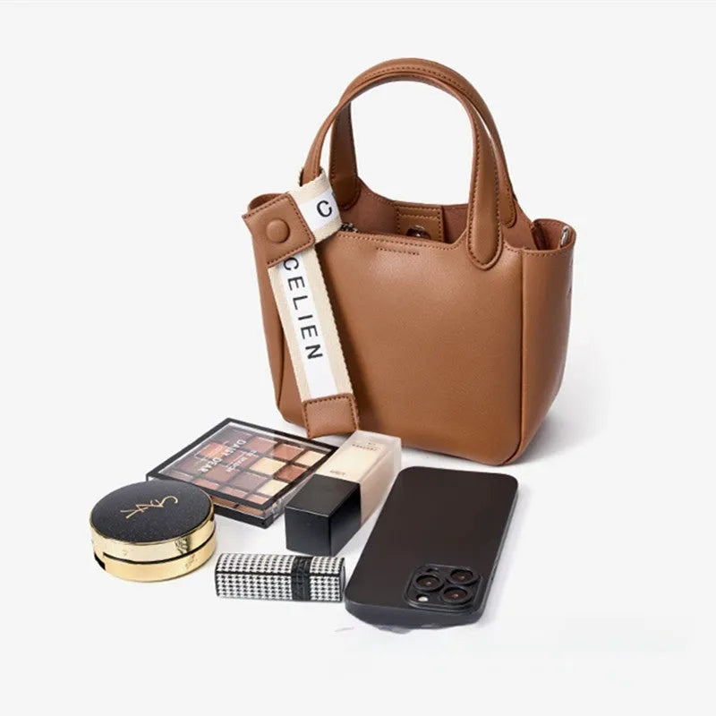 Genuine cattlehide leather retro cross body bucket bag in square vertical shape shown in brown colour.