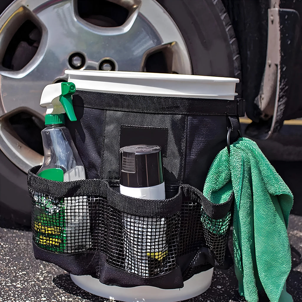 Black cylindrical polyester hanging storage bag attached to a 5-gallon barrel.