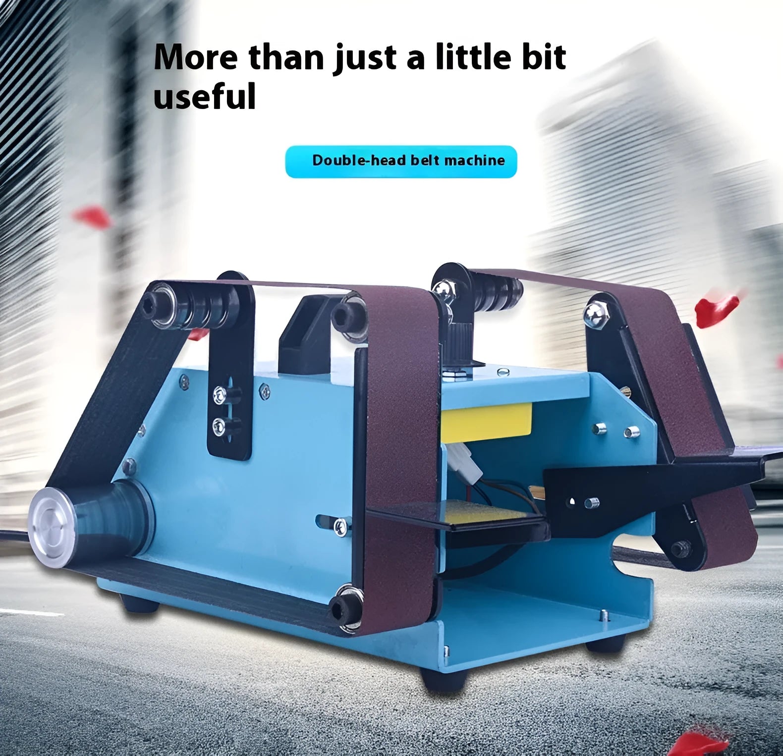 Blue desktop dual-axis belt sander with two sanding heads and a variable speed switch, shown on a workshop bench.