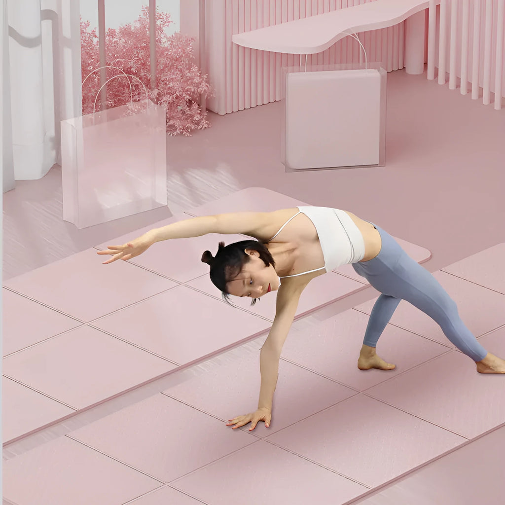 Blue foldable TPE gymnastic mat, unfolded flat on a floor, showing its six-panel design.