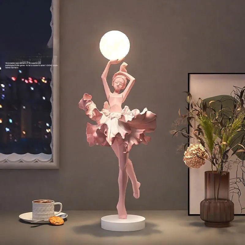 Small modern resin night light ornament with USB charging cable in black gold colour.
