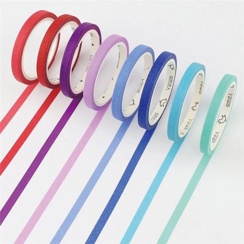 Roll of solid colour paper tape in 5mm width, shown in crimson and deep purple options