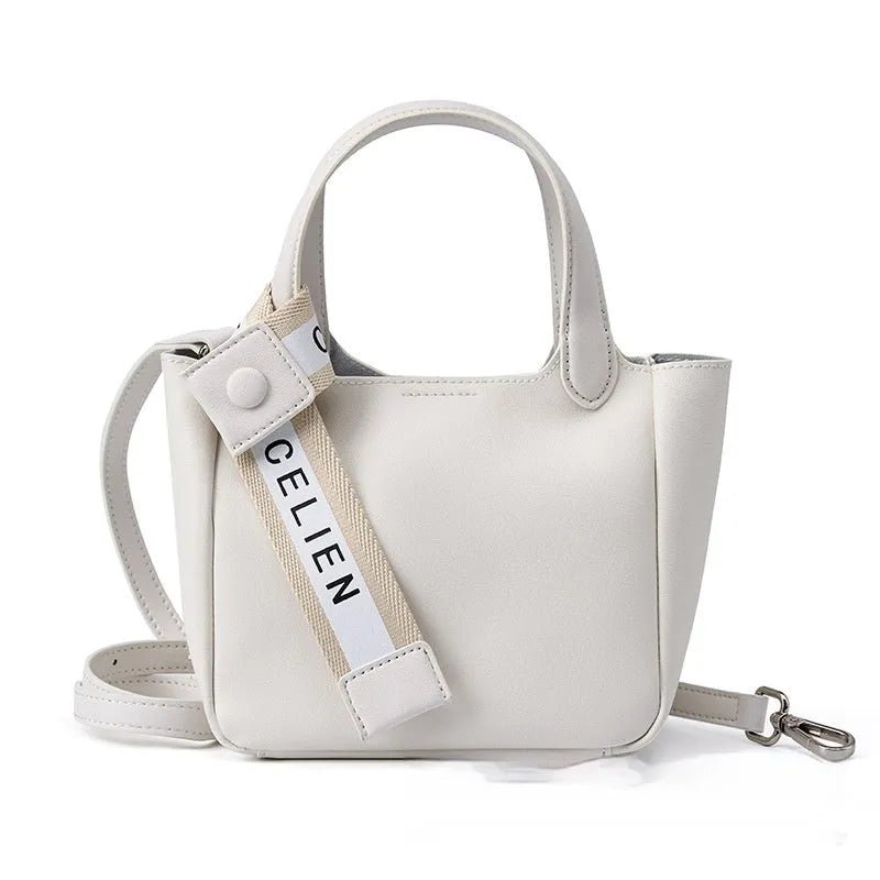 Genuine cattlehide leather retro cross body bucket bag in square vertical shape shown in brown colour.