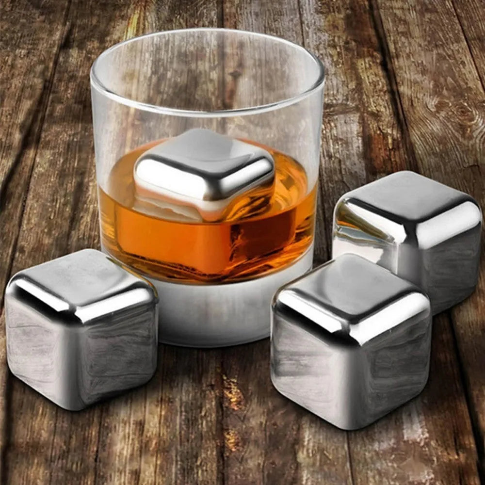 Stainless steel whiskey chilling stones in square, ball, diamond, and heart shapes with handling clip