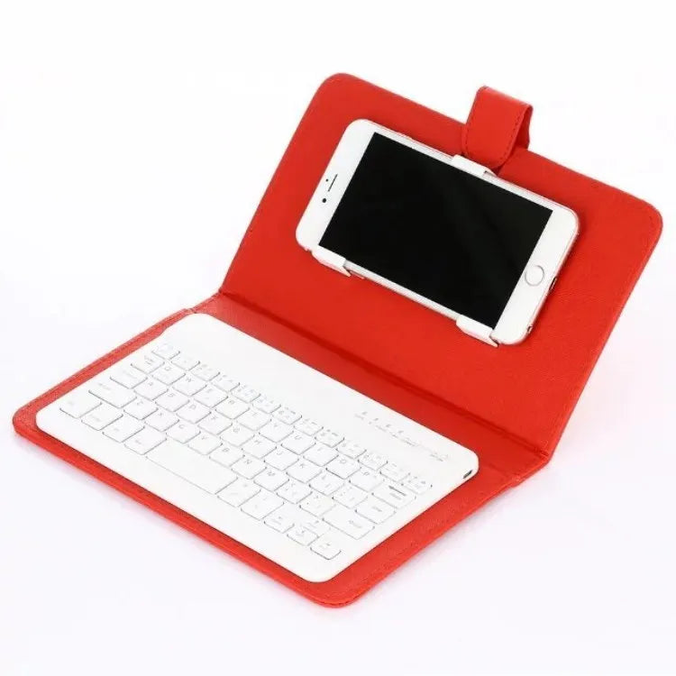Black wireless Bluetooth keyboard integrated into a protective case for a mobile phone.