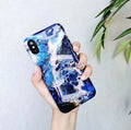 Colourful stone pattern soft back cover for iPhone on a table