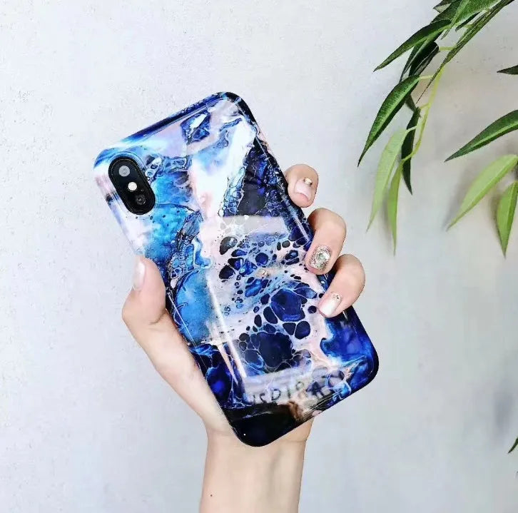 Colourful stone pattern soft back cover for iPhone on a table