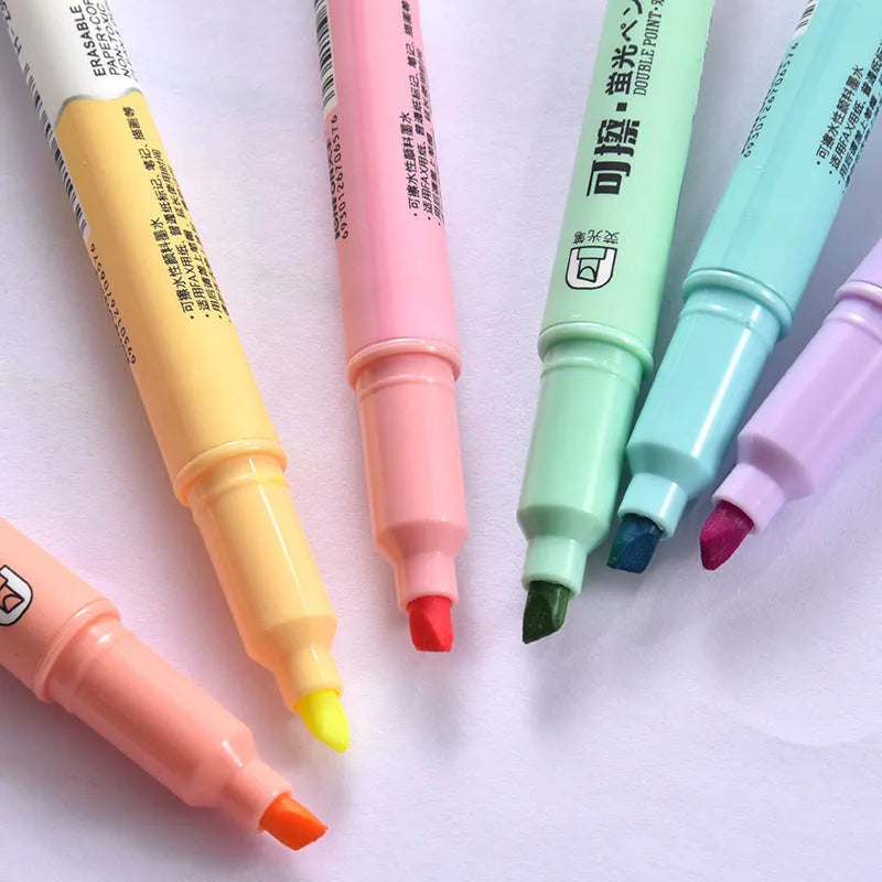 Set of six double-headed erasable fluorescent marker pens in assorted colours.