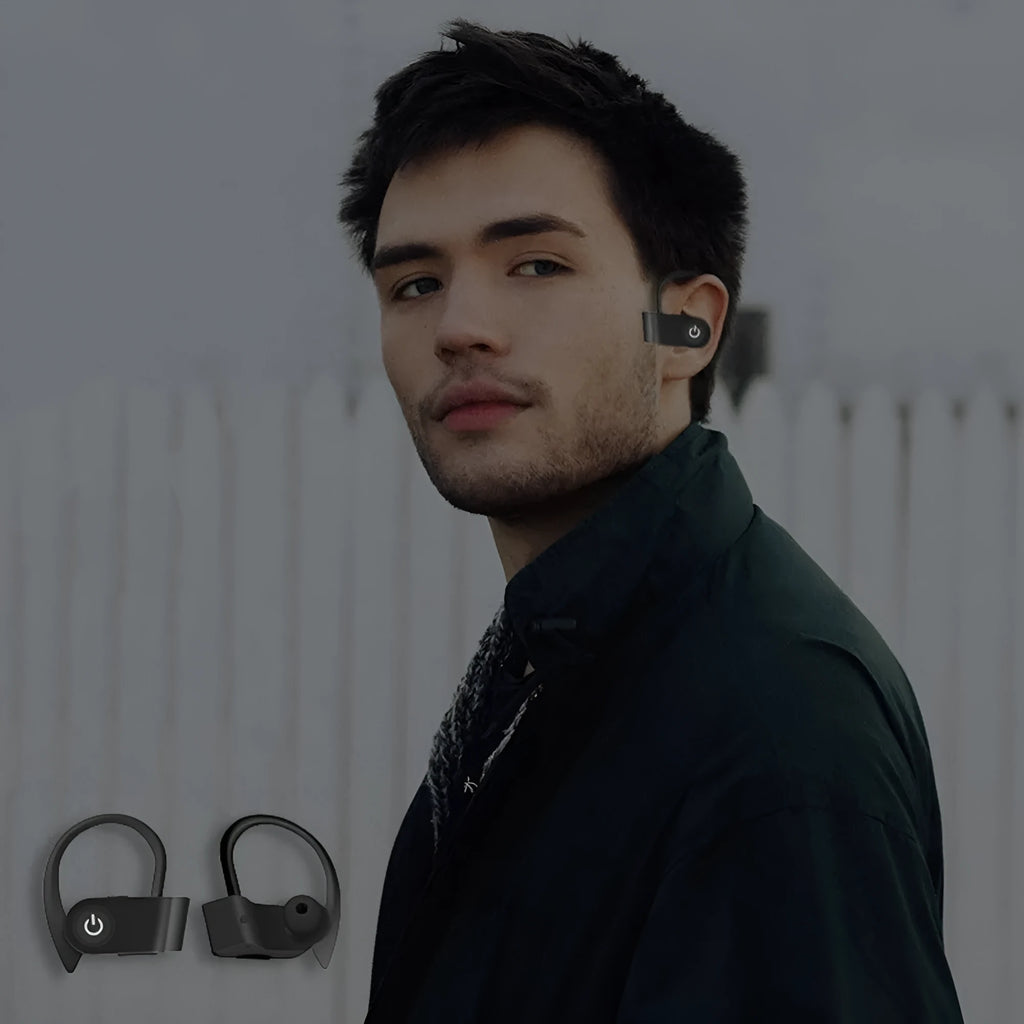 Black wireless Bluetooth in-ear headphones with ergonomic design and charging cable.