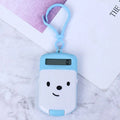 Creative cookie-shaped cute mini calculator in pink with key ring on a white background