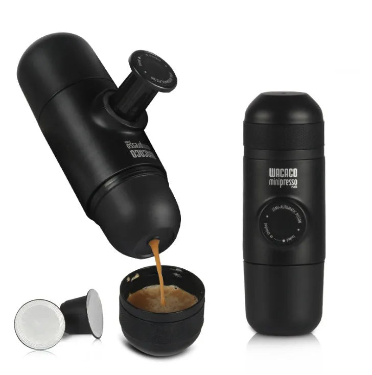 Black portable manual coffee machine measuring 6cm by 17.5cm on a table