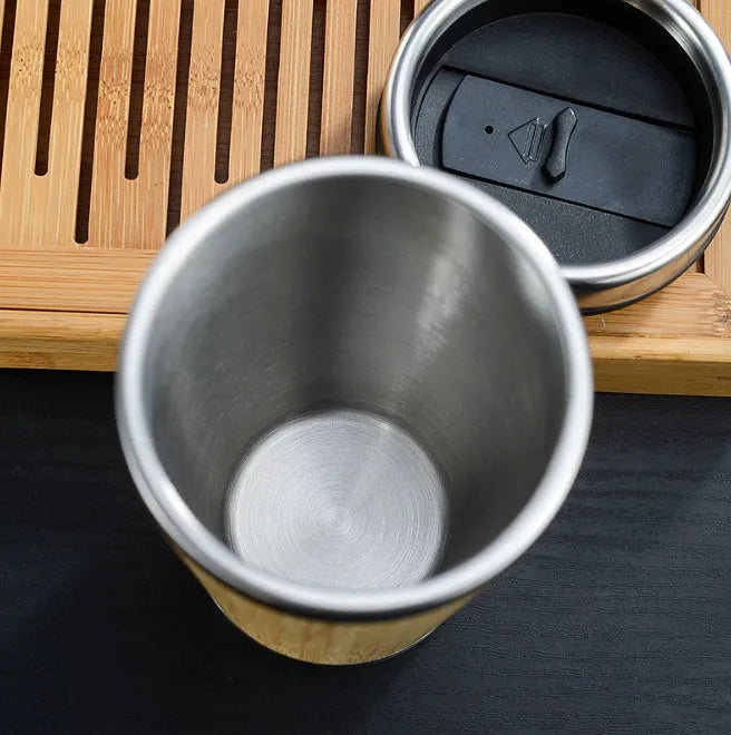 Bamboo insulated coffee cup with stainless steel interior and leak-proof lid, 420ml capacity