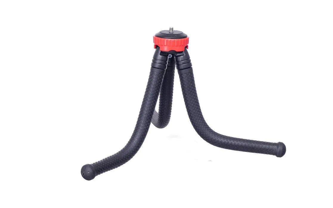 Black octopus tripod with flexible rubber legs wrapped around a pole, holding a mobile phone.