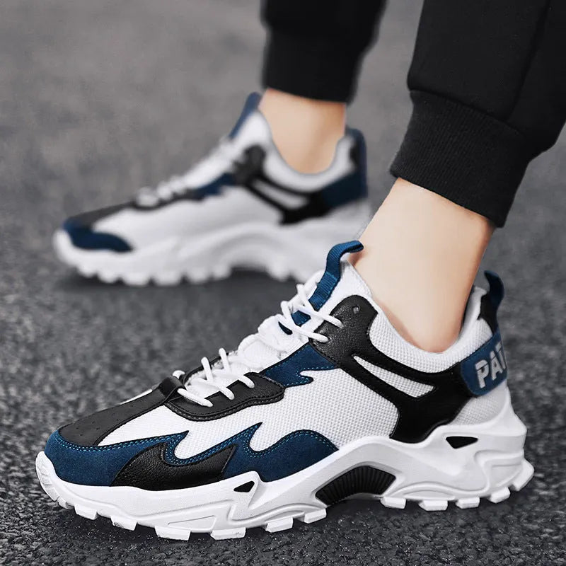 Men's breathable casual sneakers in black white colour-blocked pattern with lace-up front