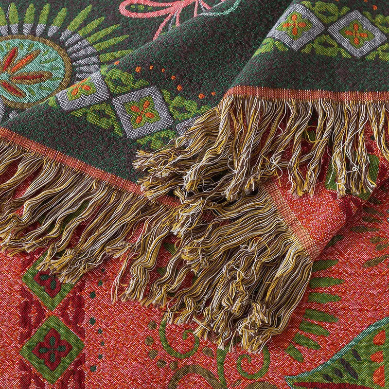 Cotton gauze towel blanket with tassel edging in neoclassical floral pattern, available in 150x200cm and 200x230cm.