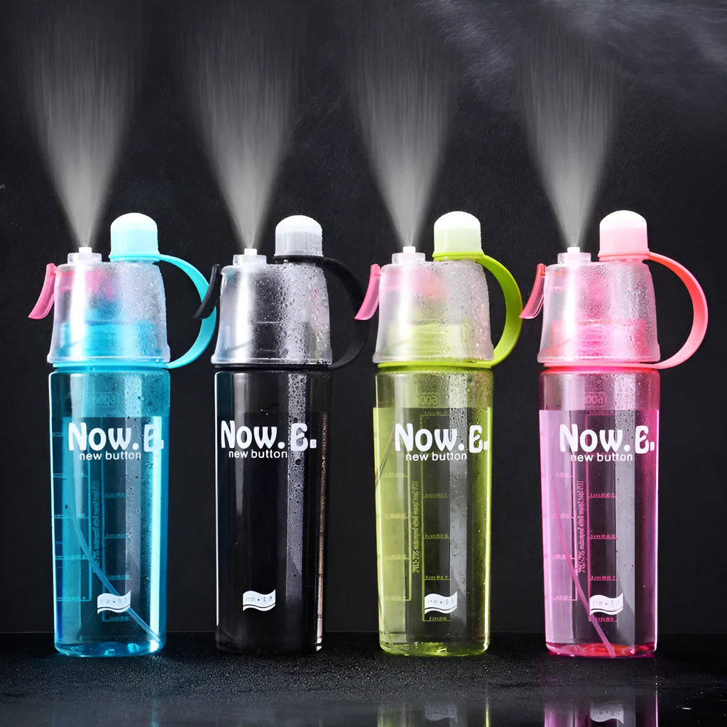 Green portable sports mist spray cup with transparent body, volume scale, handle, and spray mouth.