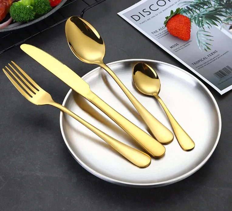 24-piece stainless steel cutlery set showing table knives, forks, and spoons in a gold colour option.