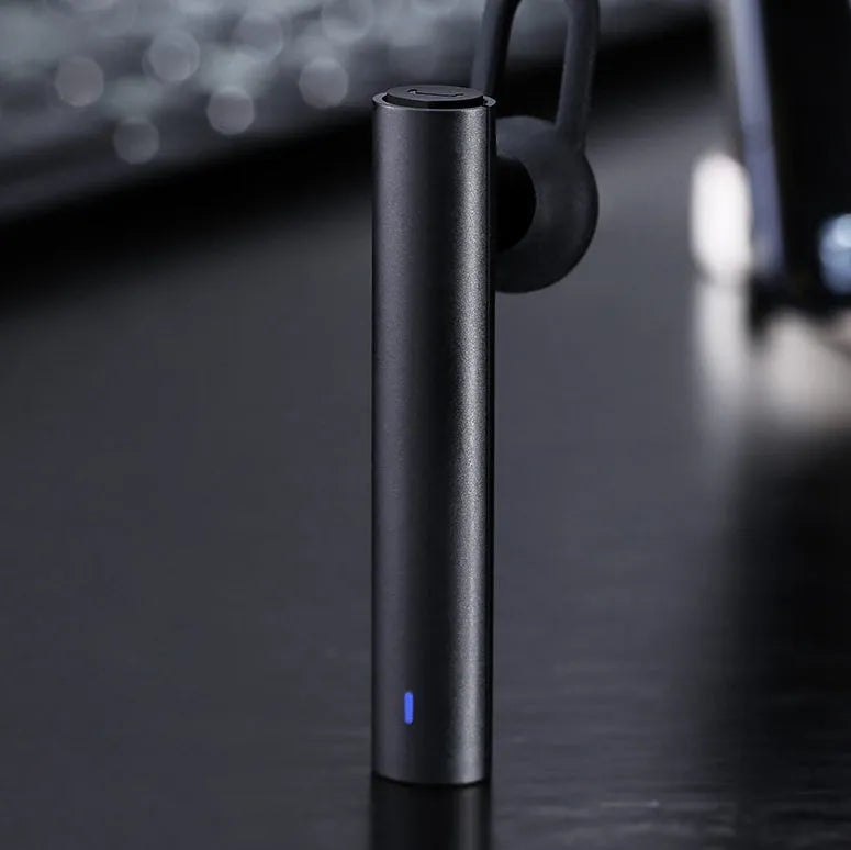 Compact wireless Bluetooth headset showing black and white colour options with 5.6cm dimensions