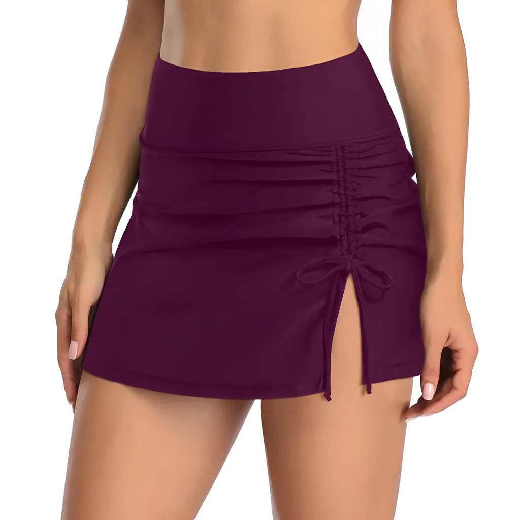 Women's solid colour brief-style swimming trunks in polyester, shown in grey.
