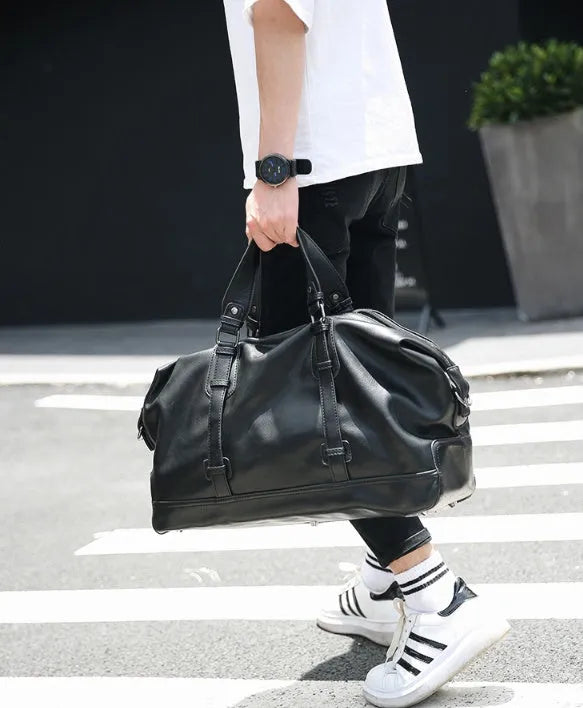 Large-capacity black PU leather handbag with shoulder strap and notebook compartment