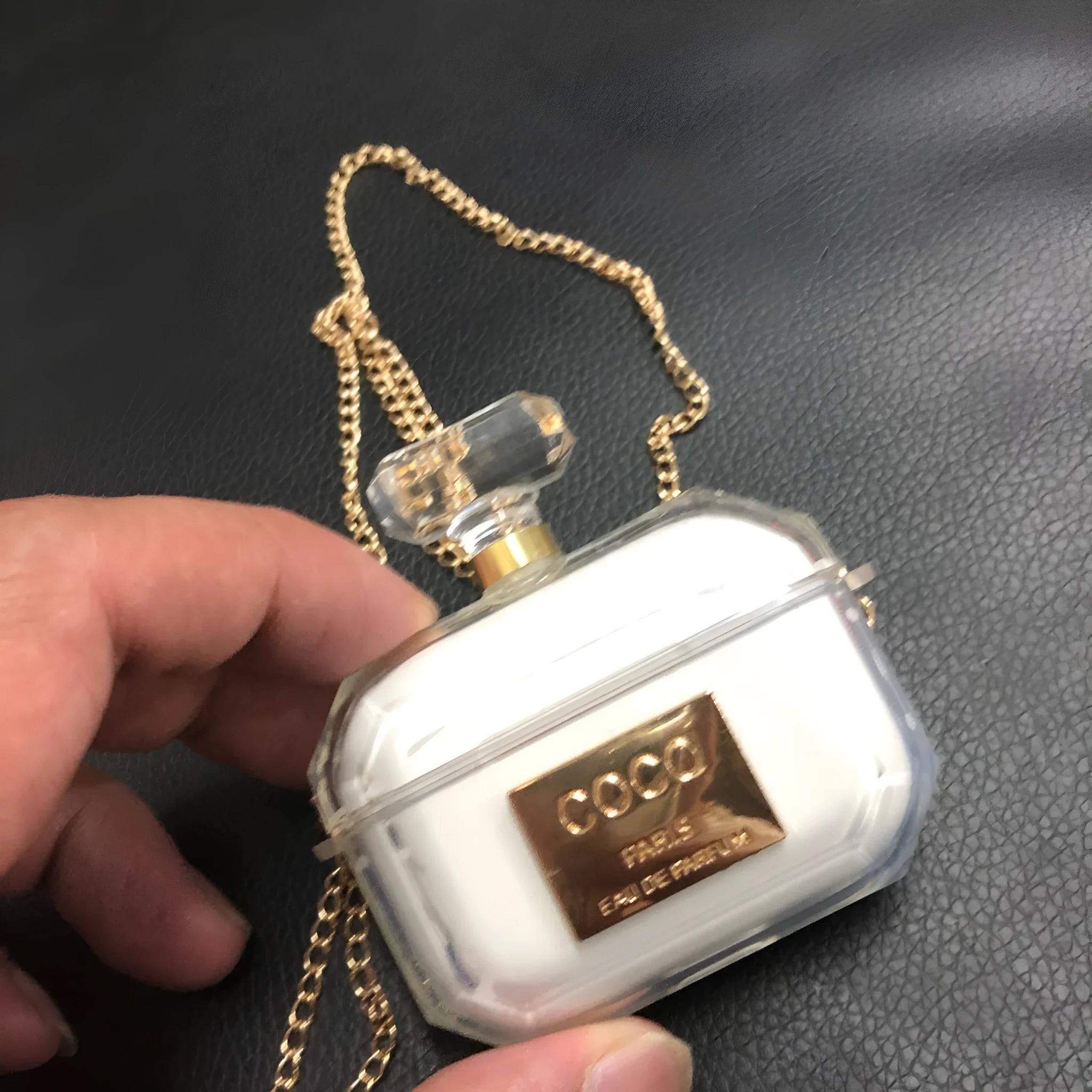 White perfume bottle design silicone protective case for Apple AirPods Pro charging box.