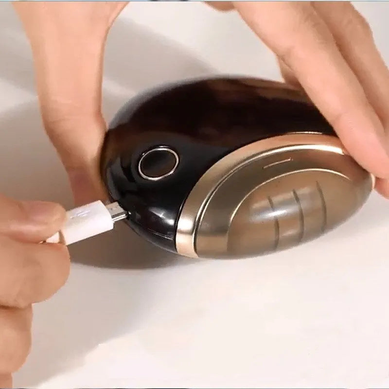 iMoll Magic S electric nail clipper in black with ABS metal plating and charging cable
