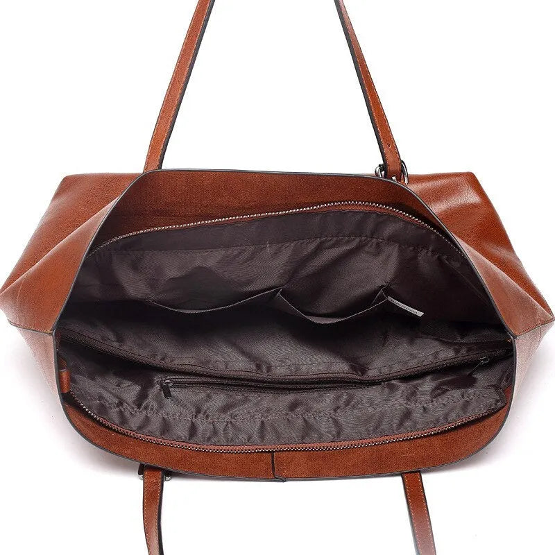 Brown waxed cowhide cross-body handbag showing front view, internal phone pocket, and adjustable leather strap.
