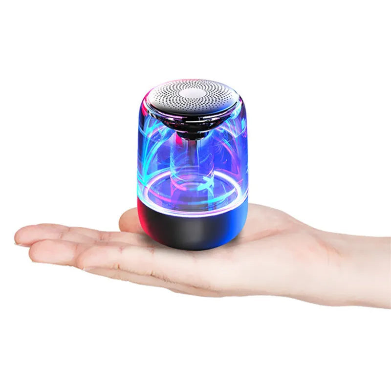 Portable Bluetooth speaker with powerful bass, variable colour LED light, compact size 90x68mm in black