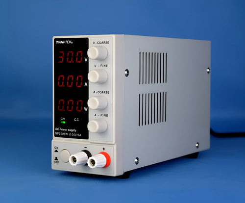 White adjustable DC power supply unit with digital display for electronics repair.