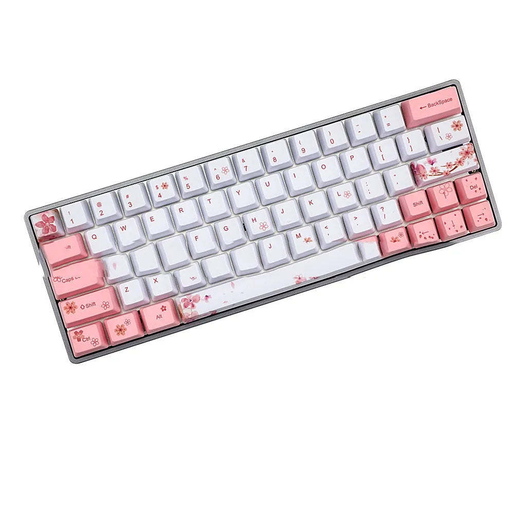 Set of pink PBT keycaps with white legends for a mechanical keyboard, shown from multiple angles.