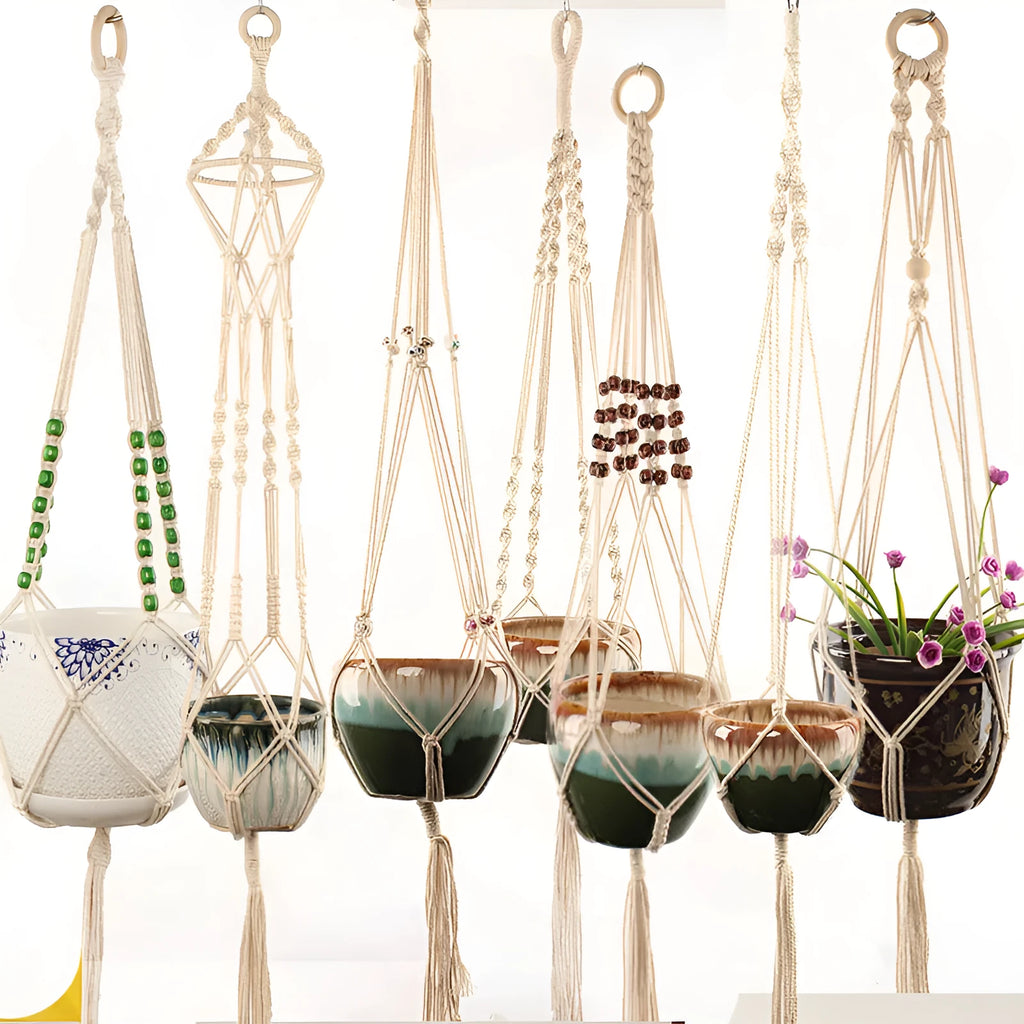 Woven wire plant hanger made from cotton rope in a desktop display style holding a small potted plant.