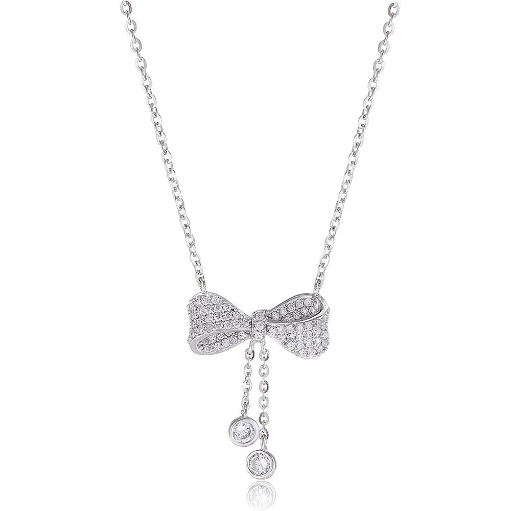 Sterling silver bow pendant necklace with O-ring chain on a 40-45cm adjustable chain.