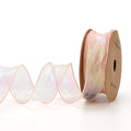 Roll of colourful wave patterned fishtail yarn decorative ribbon in mesh material, 4cm wide.