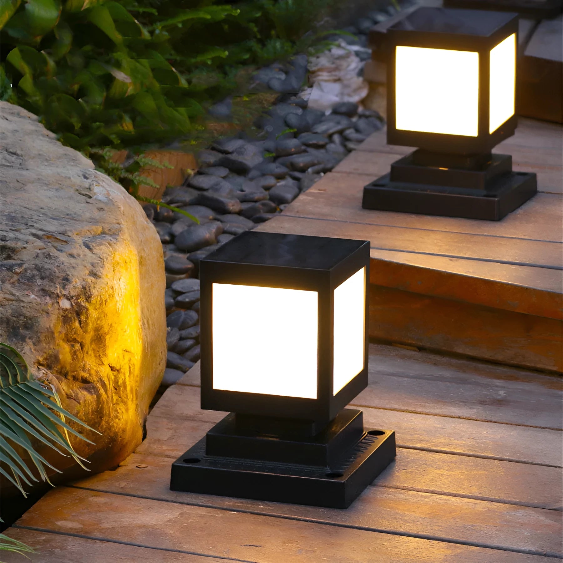 Waterproof solar-powered LED garden light in one of four styles, for wall or landscape use.