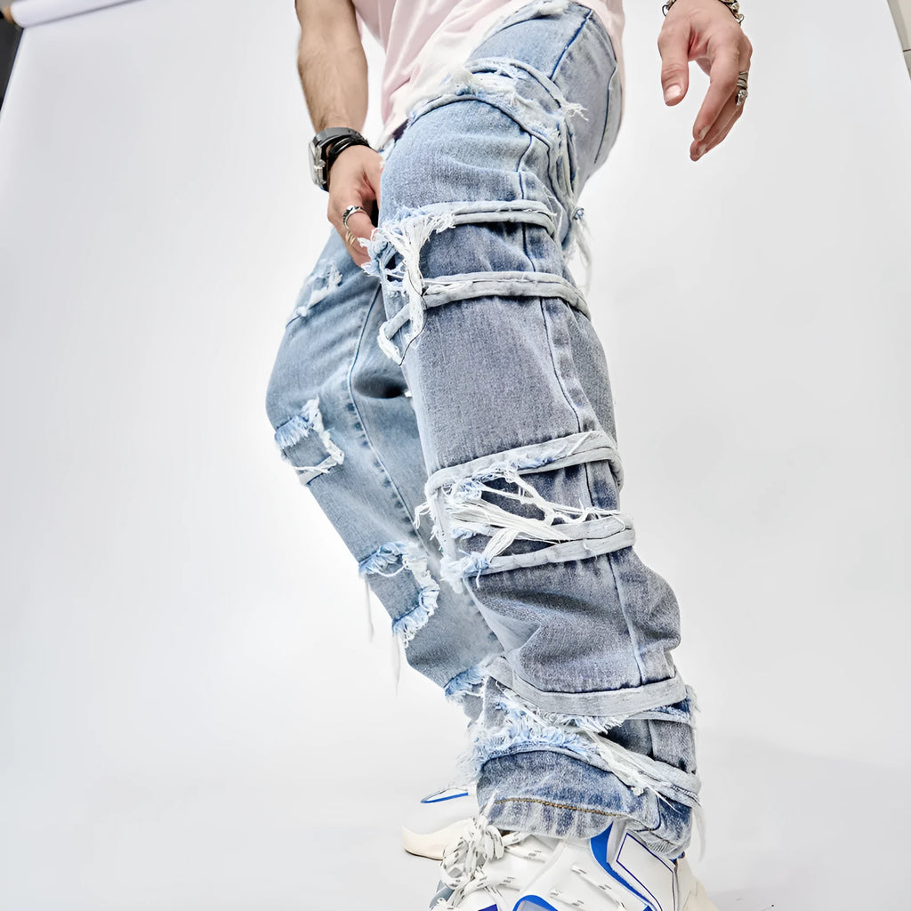 Men's blue cotton full length patched straight fit hip hop jeans on model